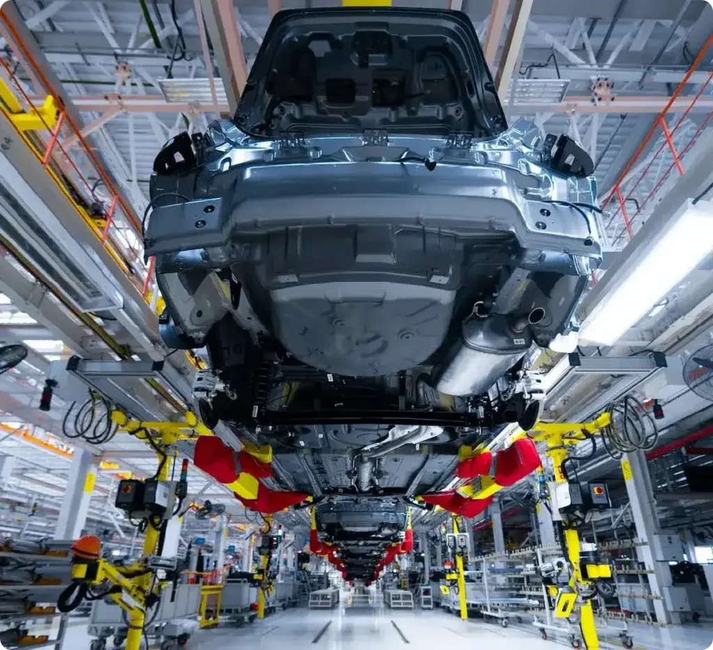 Assembly line with cars inside a modern manufacturing facility